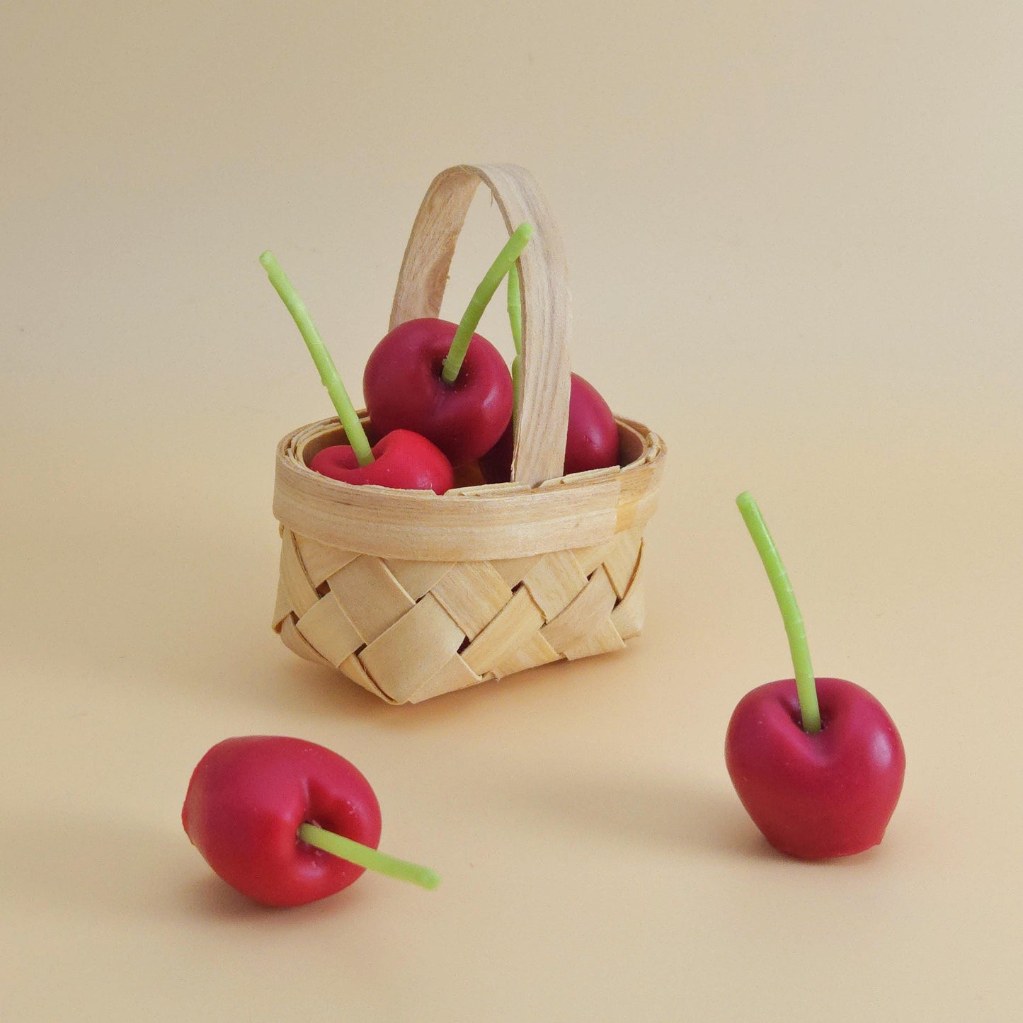 cherry candles, cherry-shaped candles, birthday cake toppers, birthday candles, scented cherry candles, basket of cherry candles, handmade candles, scented soy wax for gifts and decoration, home decor, cherry candle set, gift set, unique candle