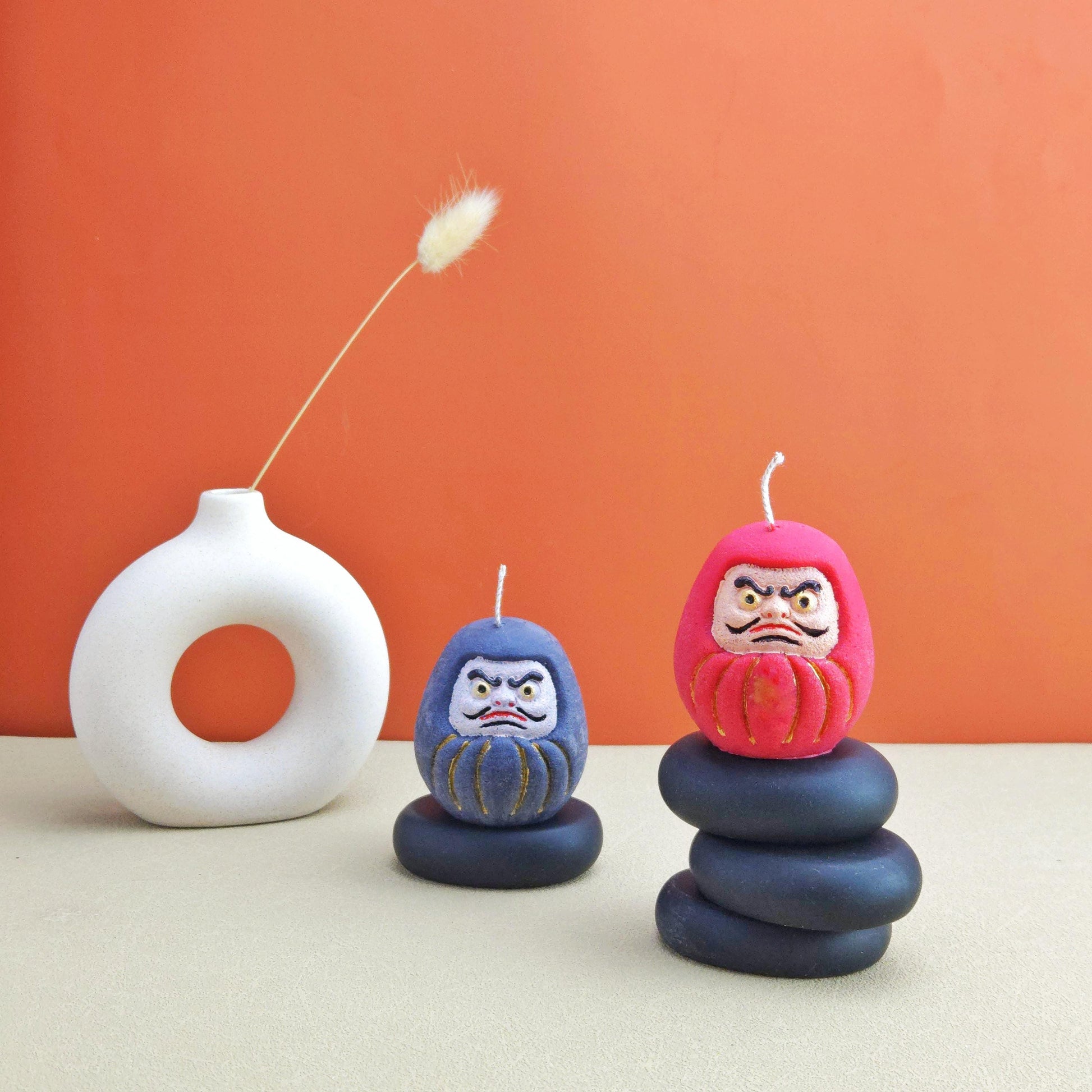 daruma doll, daruma candle, handmade candle, soy wax candle, pillar wax, good fortune candles, unique candle, lucky charm gifts, scented candle, cute candle, Japanese-style home decor, home decor, positive energy candles, inspirational gift ideals