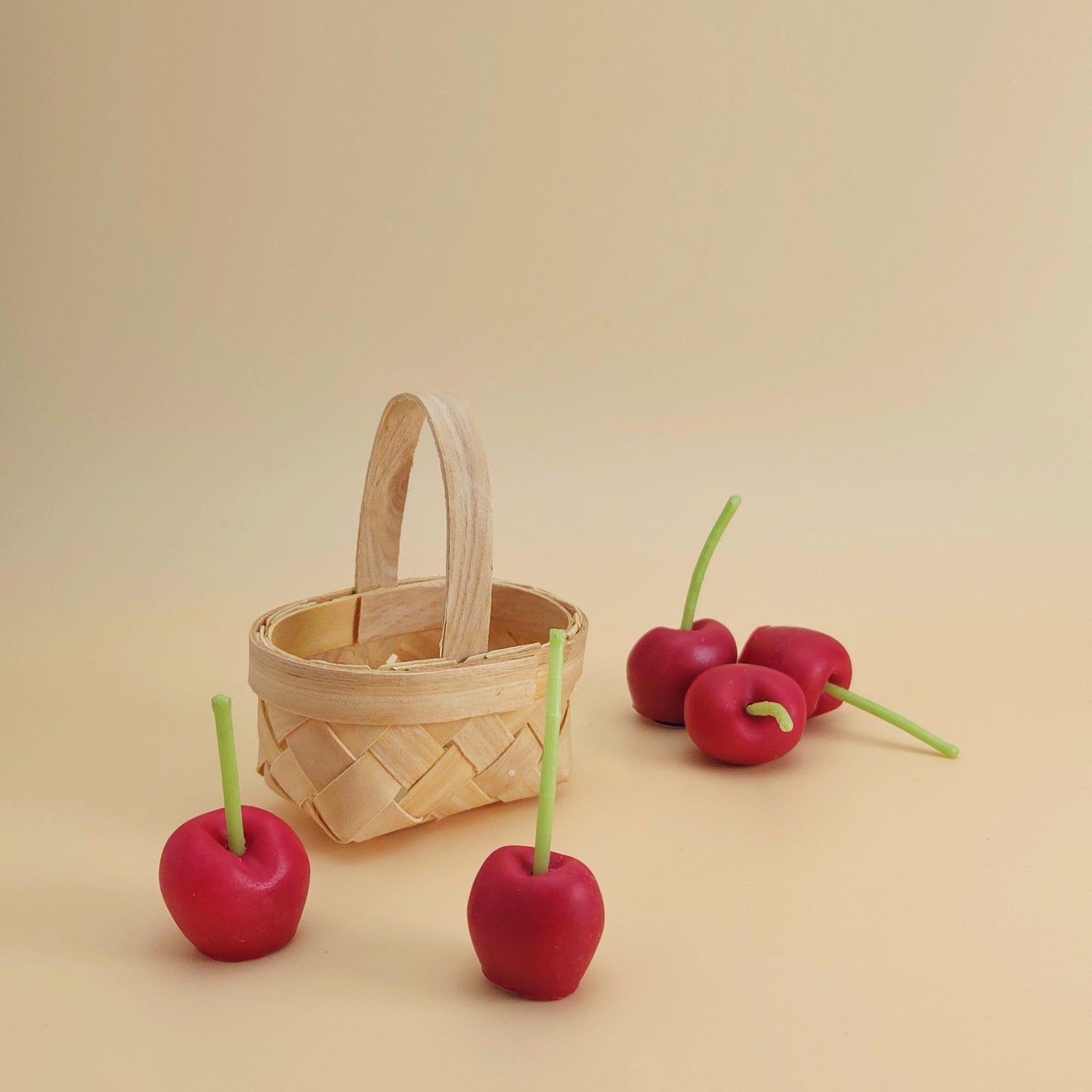 cherry candles, cherry-shaped candles, birthday cake toppers, birthday candles, scented cherry candles, basket of cherry candles, handmade candles, scented soy wax for gifts and decoration, home decor, cherry candle set, gift set, unique candle