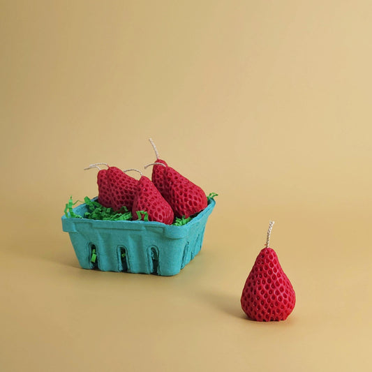 realistic basket of strawberry candles, strawberry set candle, blue pulp basket of strawberries, red strawberry with wick on yellow background, green crinkle cut paper inside, gift of cake topper, birthday strawberry topper, berry with holes, looks like real strawberry, birthday candles, home decor, kitchen decor candles, giving off a sweet strawberry scent, juicy strawberry, strawberry-shaped soy candles