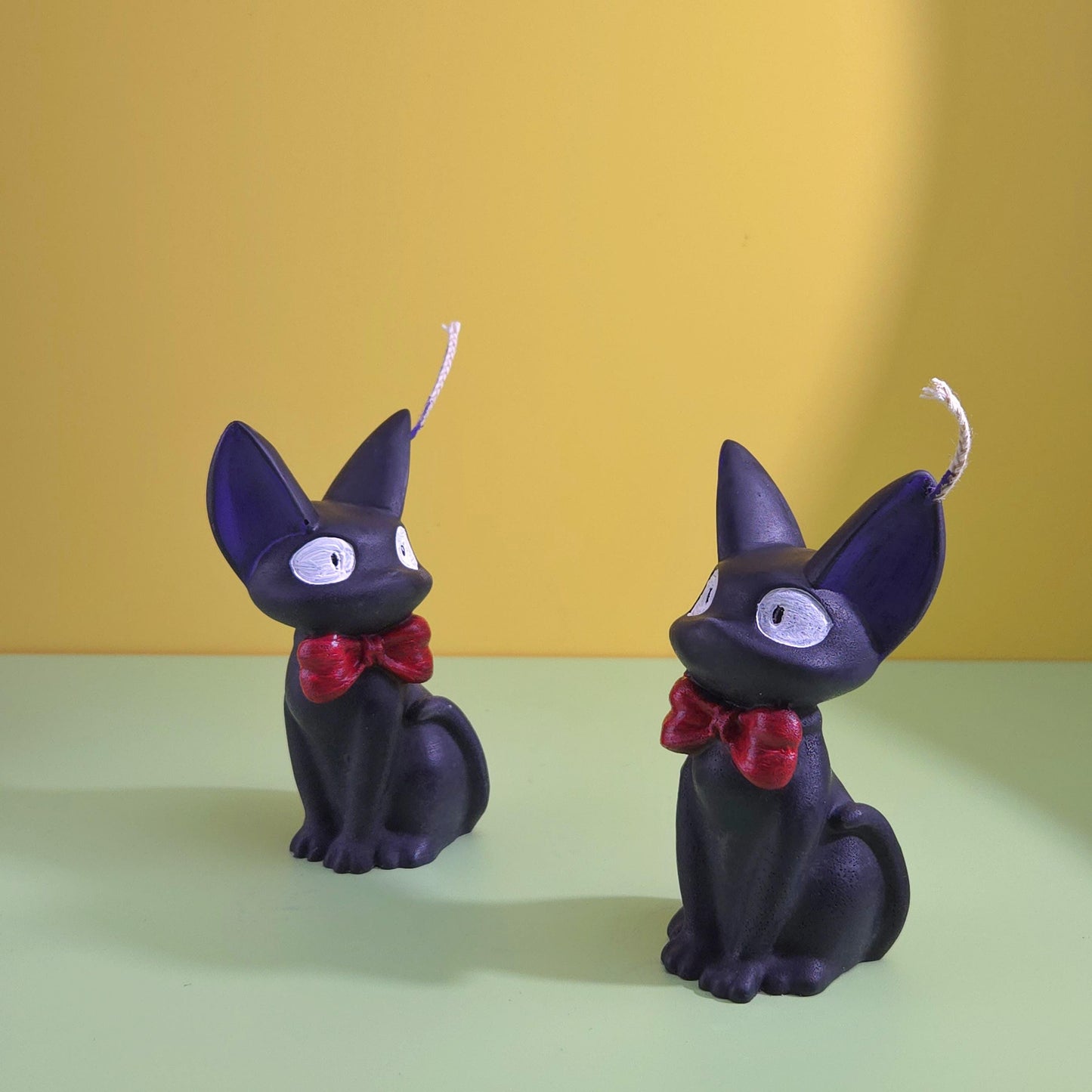 Hand-poured soy wax Jiji black cat candle with red bow tie, inspired by Kiki’s Delivery Service, Studio Ghibli gift for anime and cat lovers, 2.5x3.5 inches.