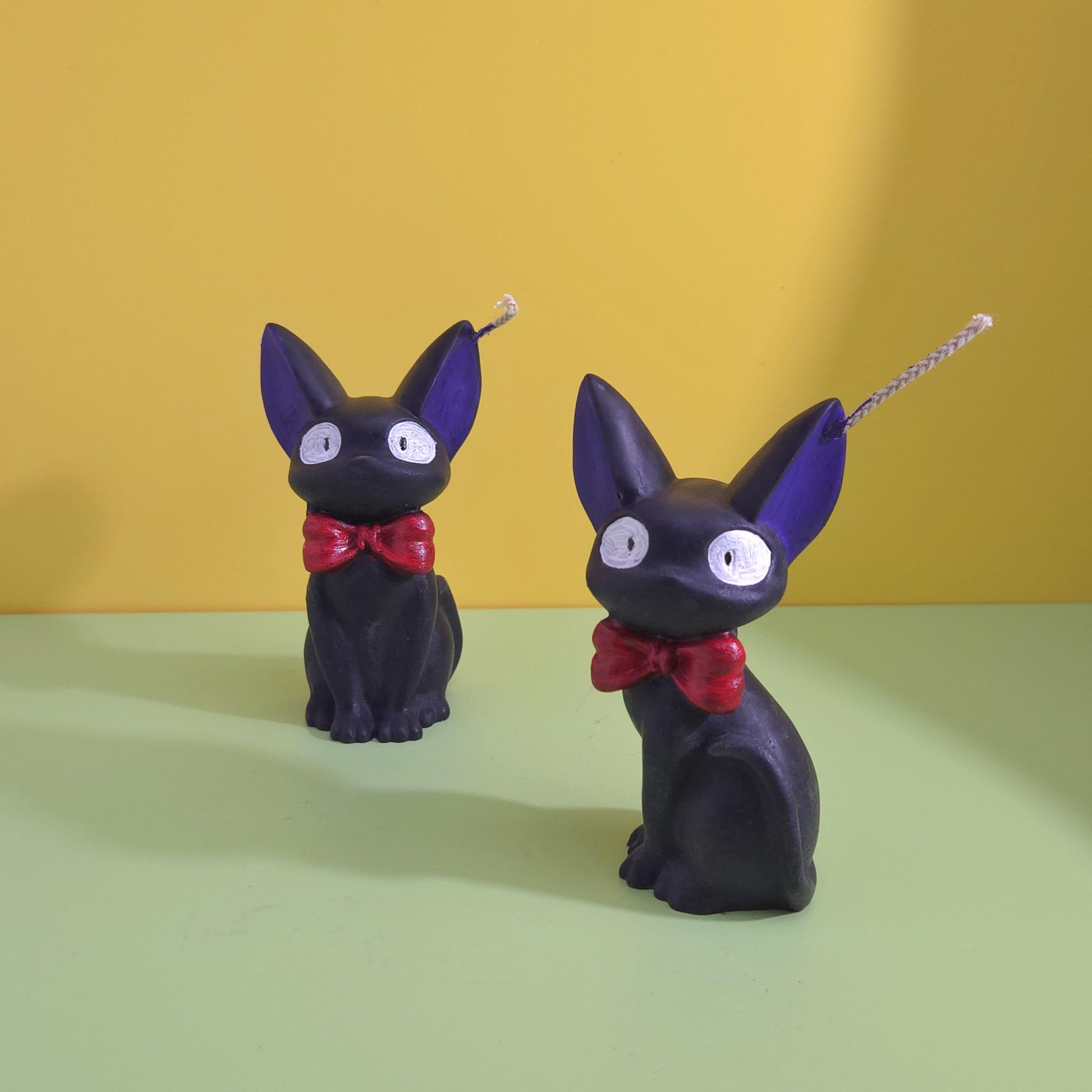 Hand-poured soy wax Jiji black cat candle with red bow tie, inspired by Kiki’s Delivery Service, Studio Ghibli gift for anime and cat lovers, 2.5x3.5 inches.