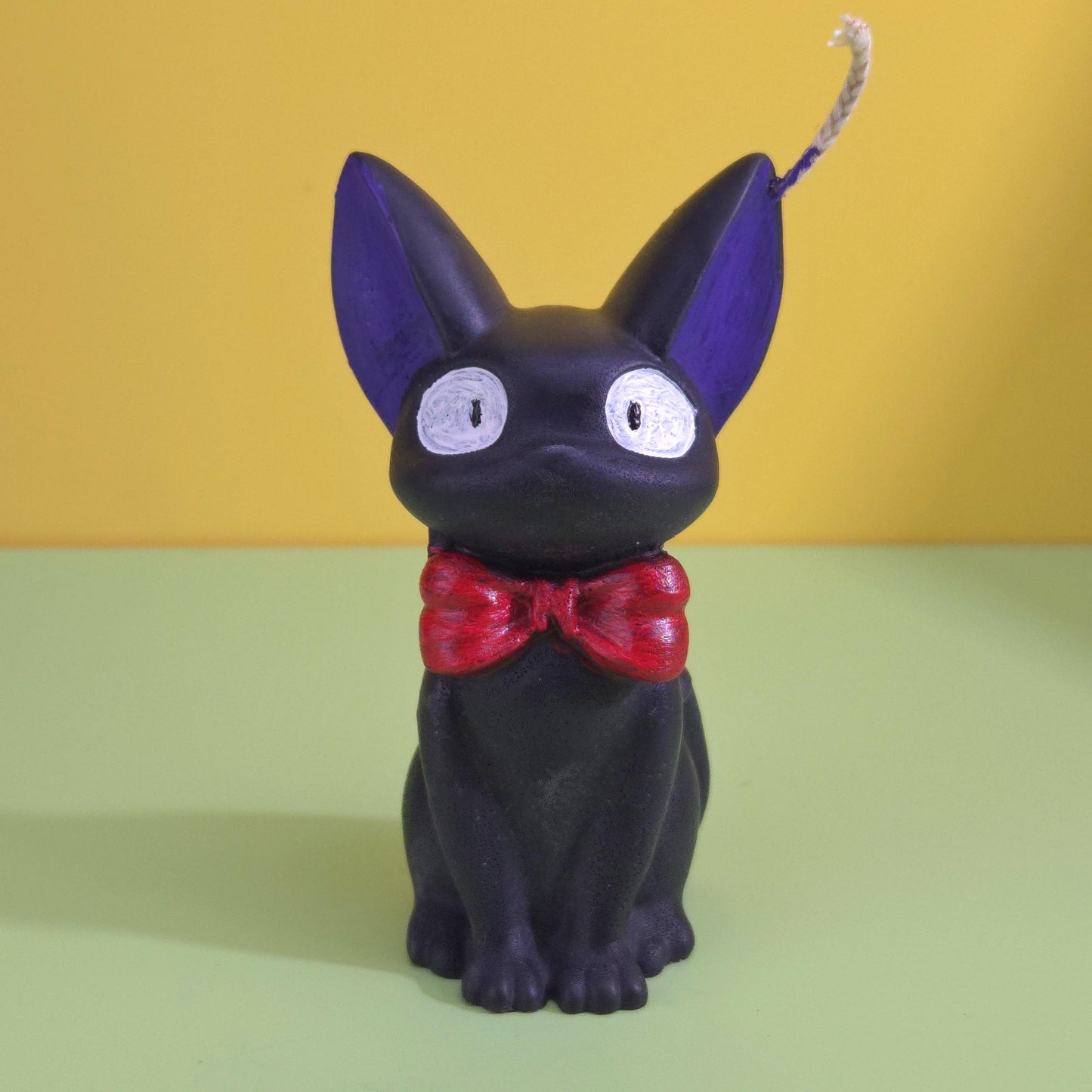 Hand-poured soy wax Jiji black cat candle with red bow tie, inspired by Kiki’s Delivery Service, Studio Ghibli gift for anime and cat lovers, 2.5x3.5 inches.