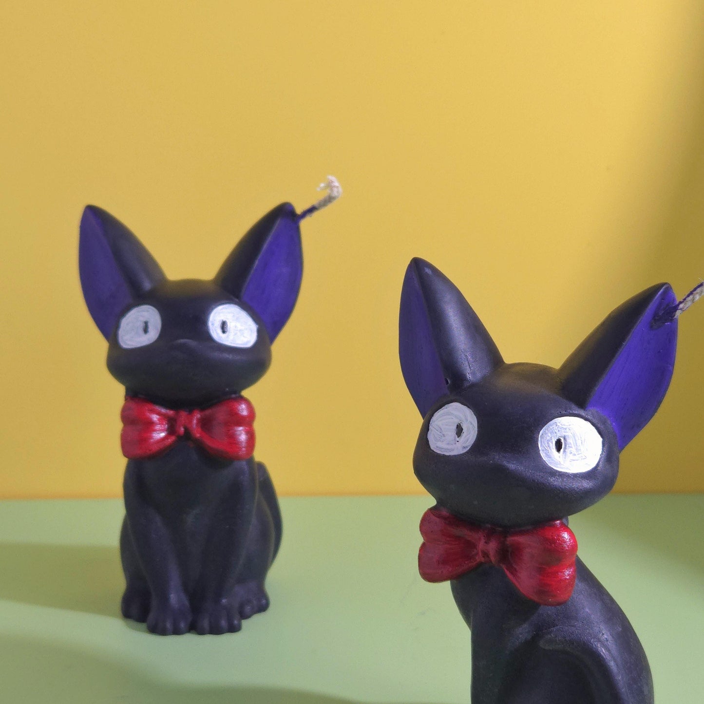 Hand-poured soy wax Jiji black cat candle with red bow tie, inspired by Kiki’s Delivery Service, Studio Ghibli gift for anime and cat lovers, 2.5x3.5 inches.
