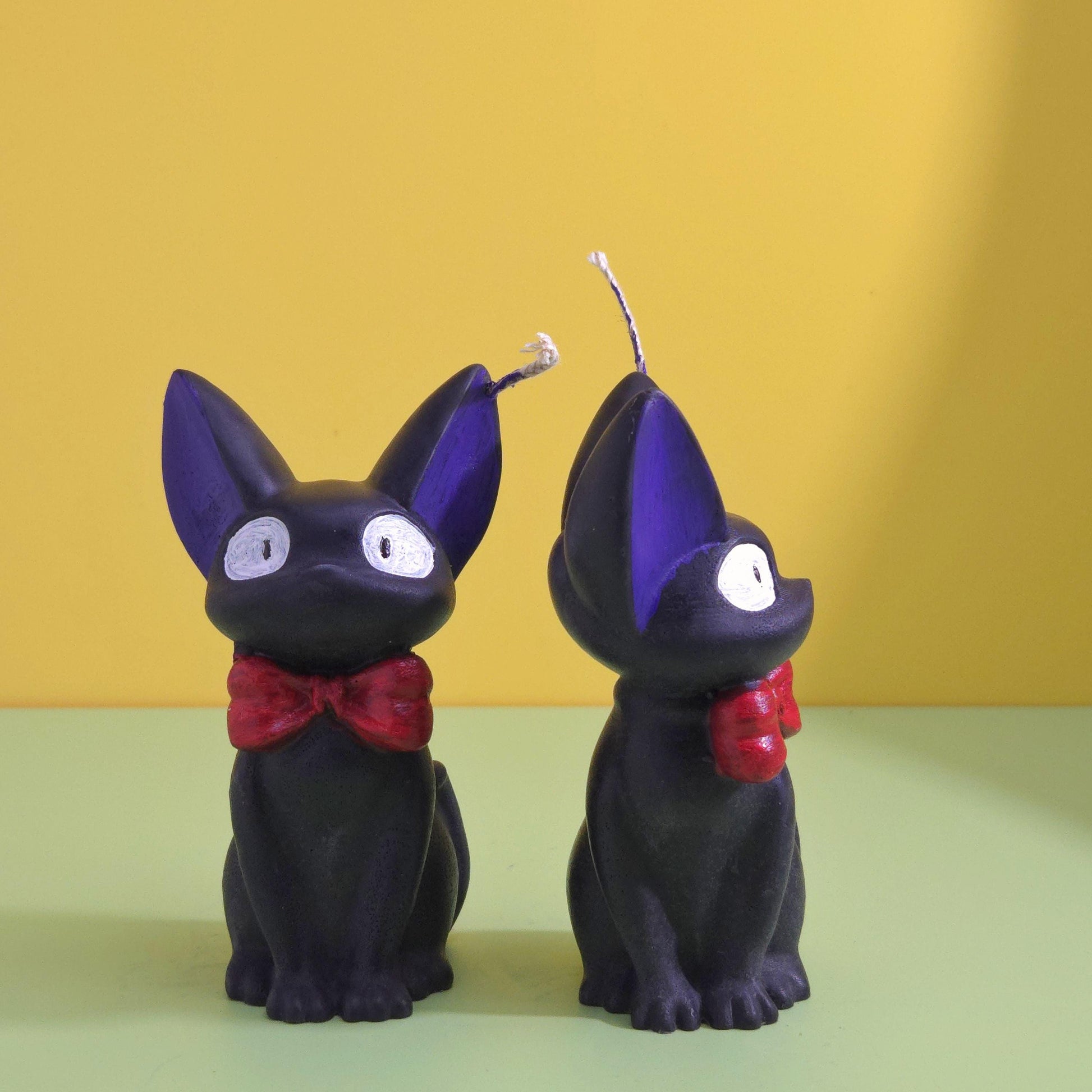 Hand-poured soy wax Jiji black cat candle with red bow tie, inspired by Kiki’s Delivery Service, Studio Ghibli gift for anime and cat lovers, 2.5x3.5 inches.