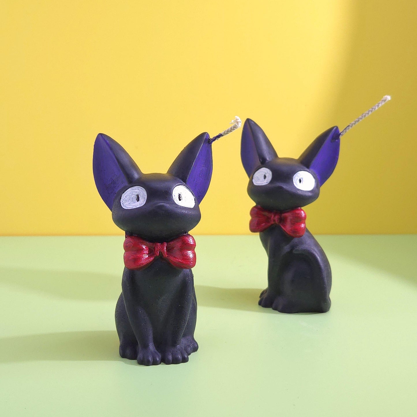 Hand-poured soy wax Jiji black cat candle with red bow tie, inspired by Kiki’s Delivery Service, Studio Ghibli gift for anime and cat lovers, 2.5x3.5 inches.